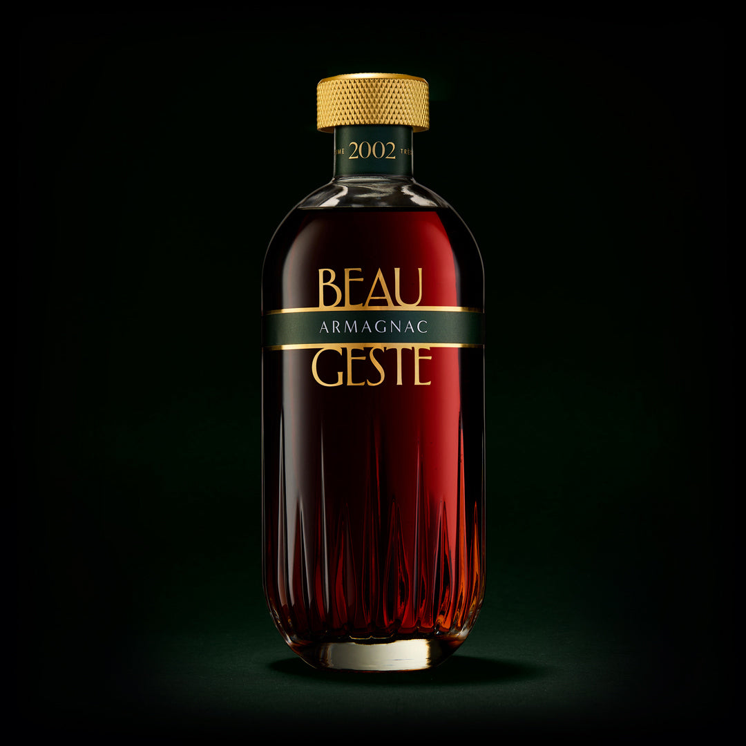 Bottle of Beau Geste Armagnac on a black background