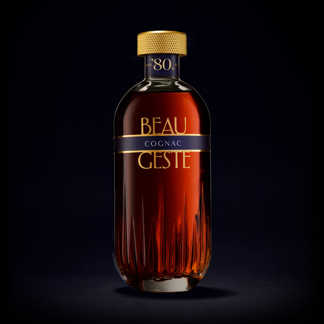 Bottle of Beau Geste Cognac on a black background