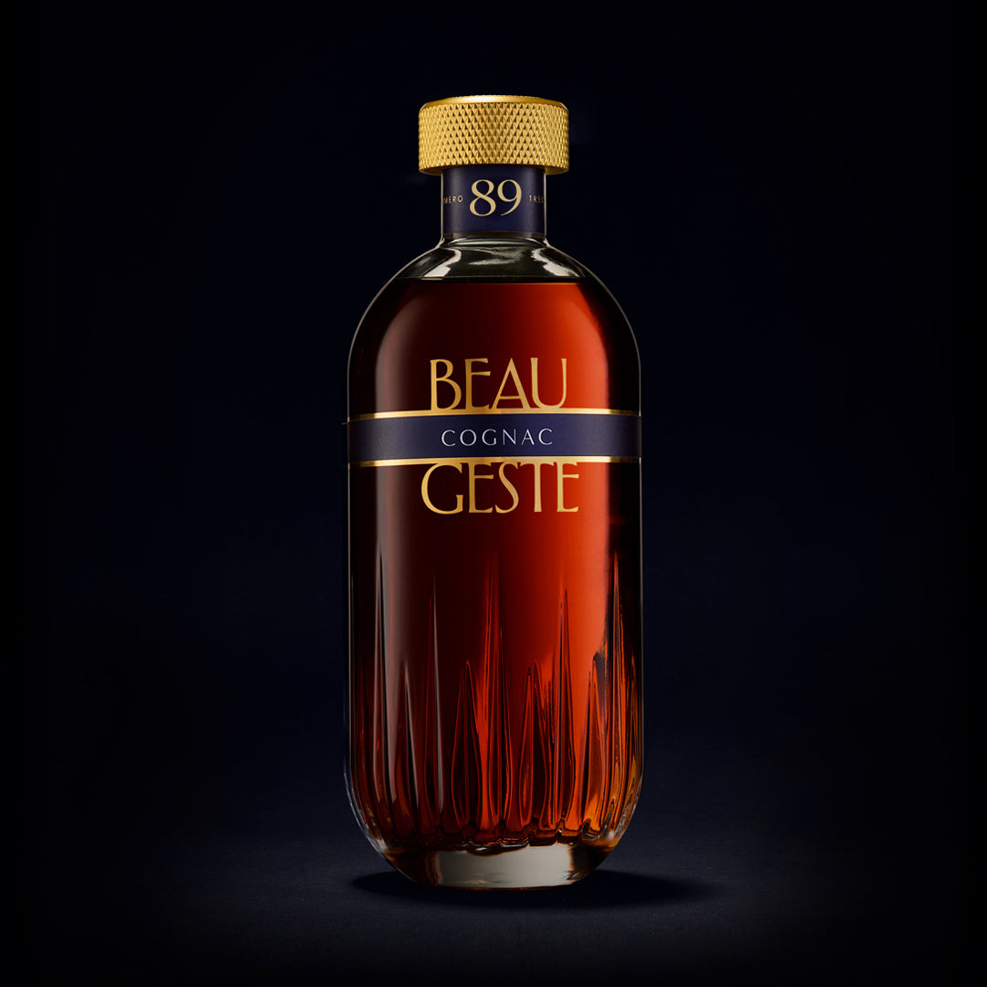 Bottle of Beau Geste Cognac on a black background