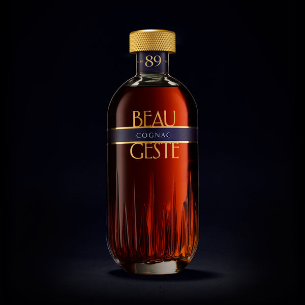 Bottle of Beau Geste Cognac on a black background